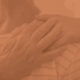 image of two hand holdering each other on the shoulder
