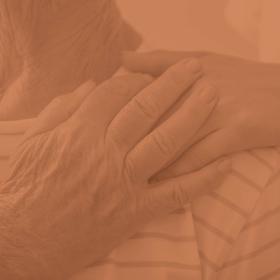 image of two hand holdering each other on the shoulder